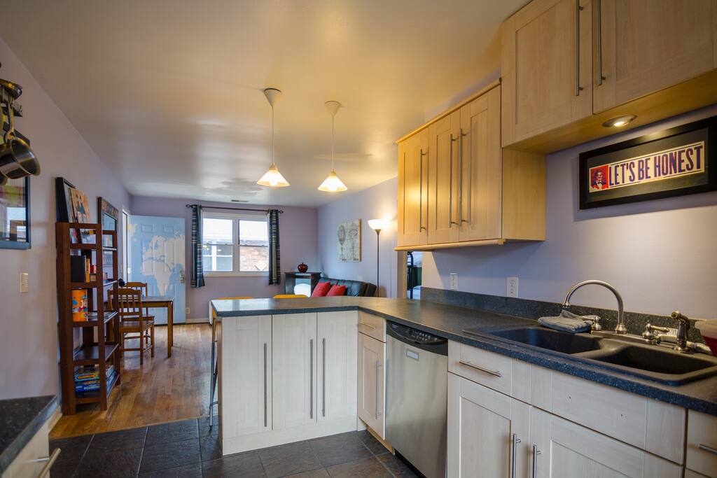 Full size refrigerator and modern kitchen.