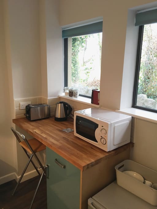 Kitchenette facilities and desk area