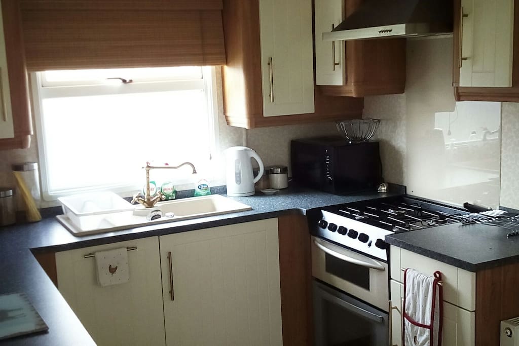 Kitchen. Fully functional and well equipped. Breakfast provided. Extra food and drinks available.