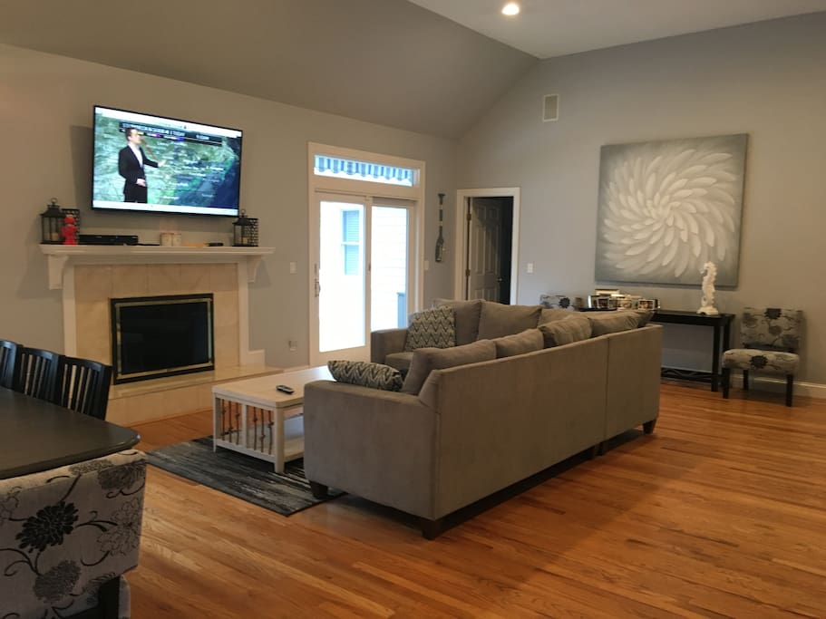 Great room with fireplace and flat screen T. V.