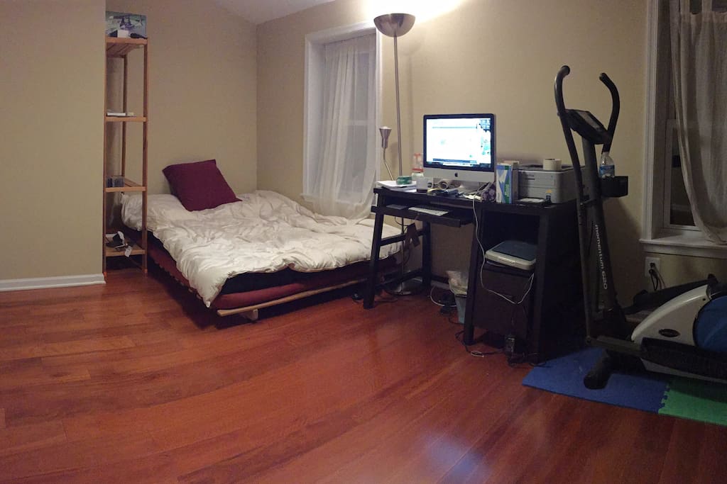 Nice bed, computer and an elliptical