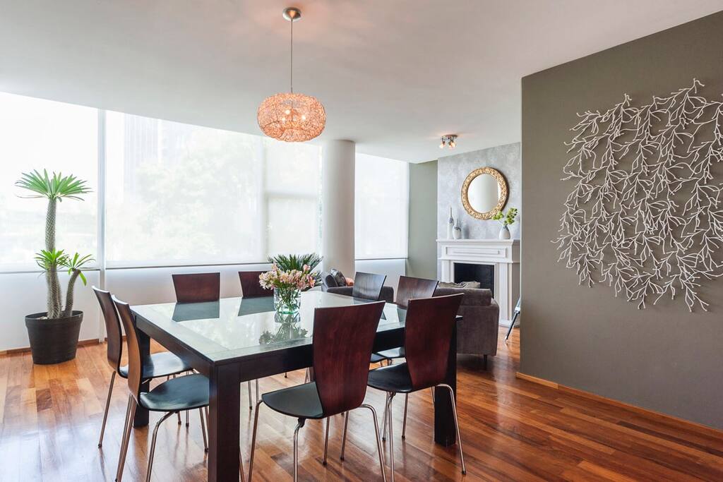 Furniture including a modern glass table & chairs.