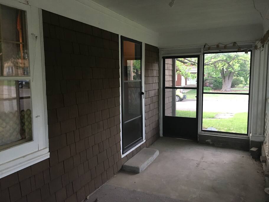 Entrance from living room to spacious screened in porch!