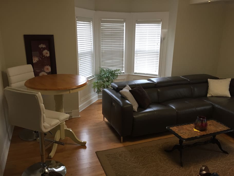 Living room with reclining sofa.