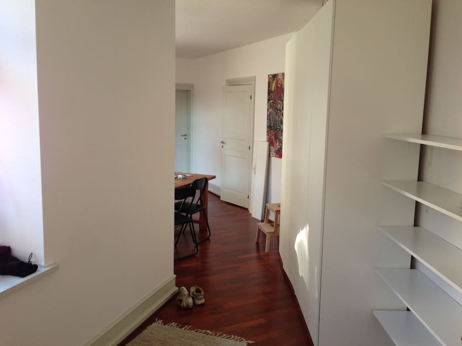 Hallway from entre to kitchen-dining area
