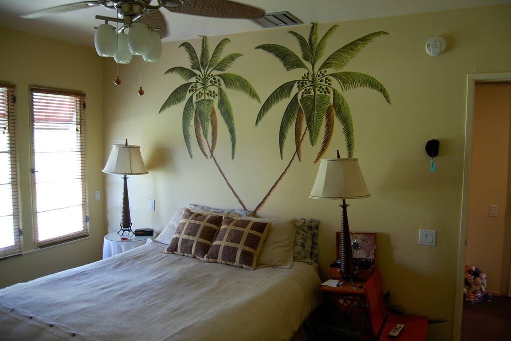 2nd bedroom is "vacation" them and custom-painted palm trees!