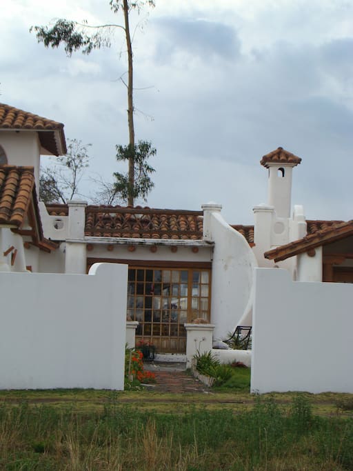 Entrance with stairs to little sun terrace above