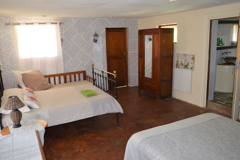 Forth en-suite bedroom with two double beds
