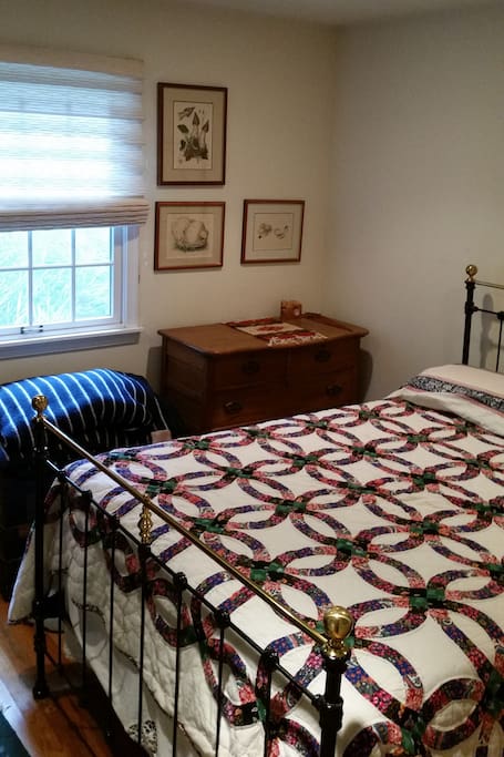 Bright south facing window overlooking garden