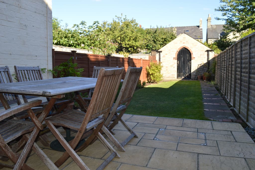 Table and chairs on the terrace in the garden
