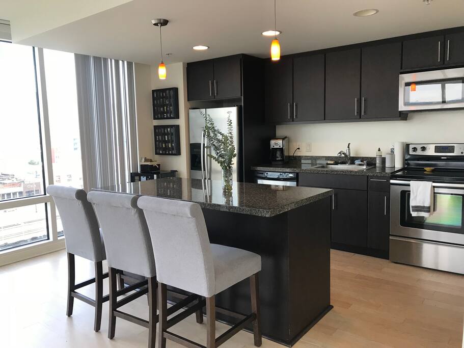 Kitchen and dining/work bar
