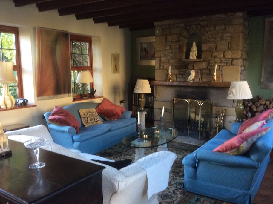 Relaxed seating by log fire (£10 extra charge for firewood supplied)