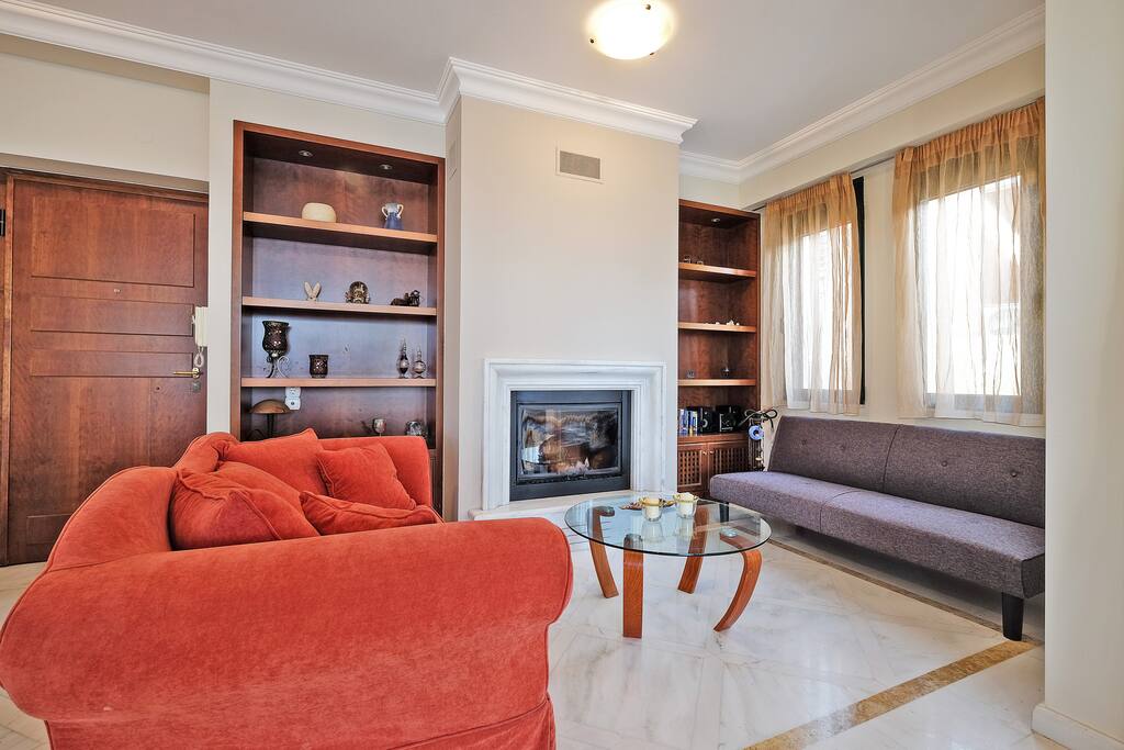 First living room with sofa that is easily converted to double bedroom