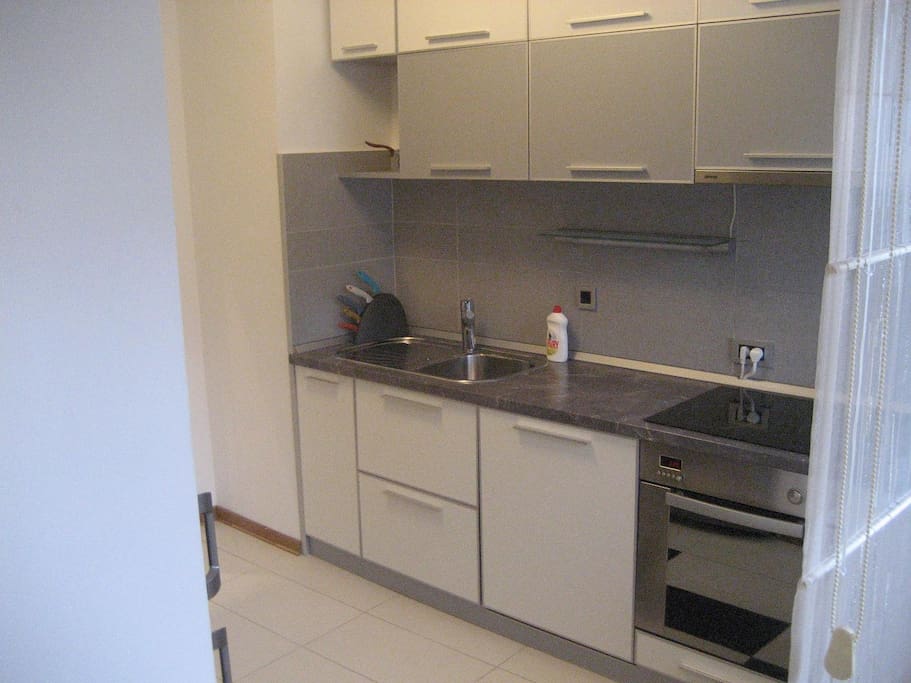 Fully equipped kitchen where you can prepare your meals. A kitchen has access to a terrace