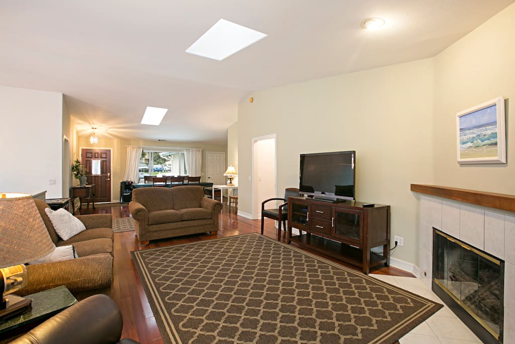 Enjoy the ambiance of the gas fireplace in this spacious room while watching a film on the 45” flat screen TV.