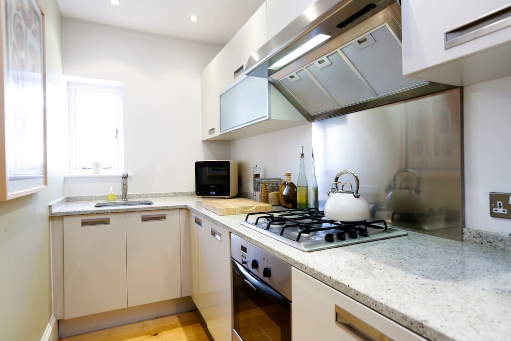 Modern galley kitchen fitted with all mod cons