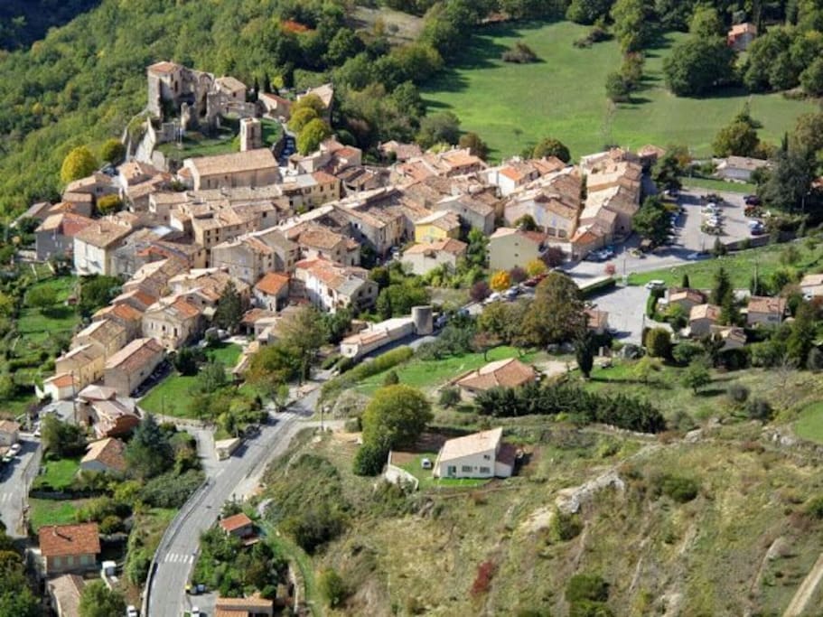 Aerial view of the village of Greolieres, as seen from a paraglider