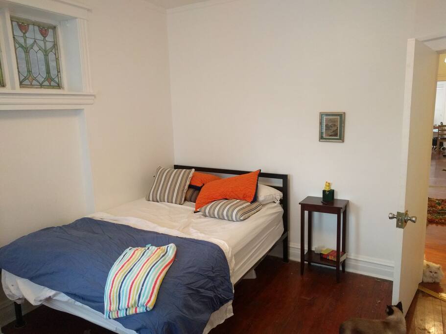 Updated view of bed & bedroom.