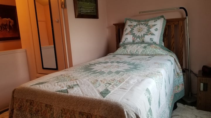 Rm. 3 Attic nook comfortable twin bed, no TV in room itself.
One guest only!