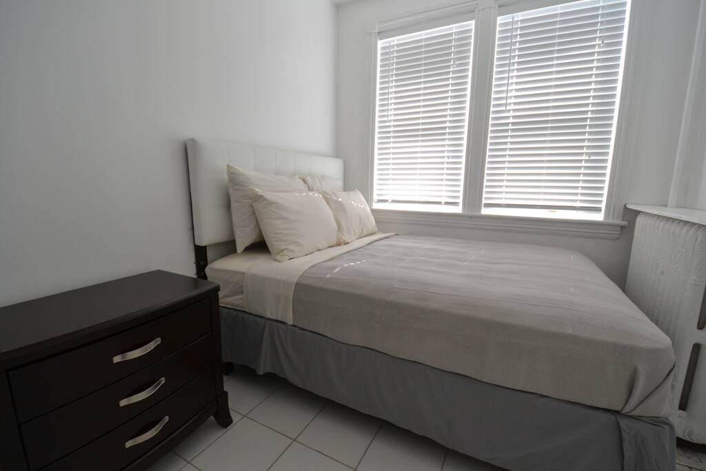 Bedroom is airy, new mattress, bed and linens