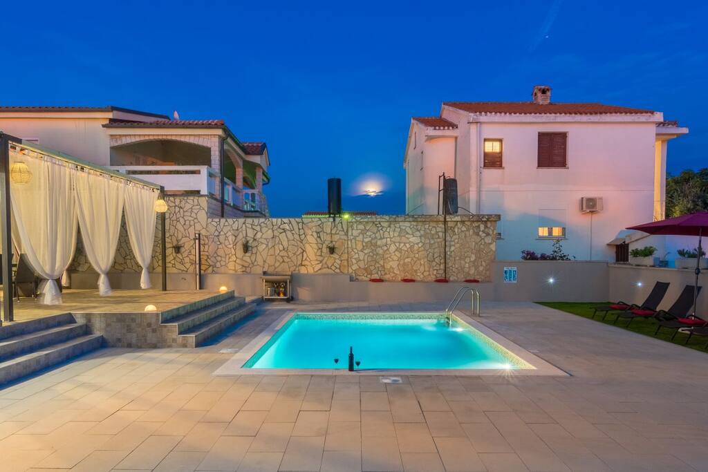 Villa Laura's pool in the evening