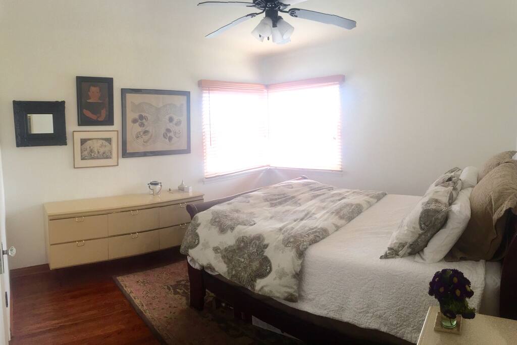 First bedroom with closet & dresser