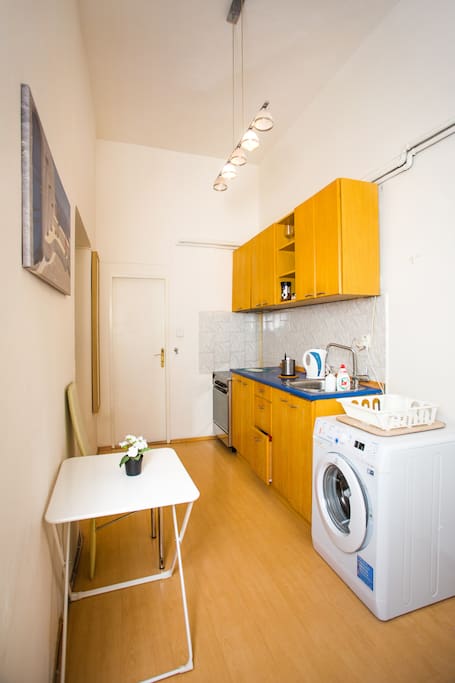 Shared kitchen with entrance to shared shower and toilet