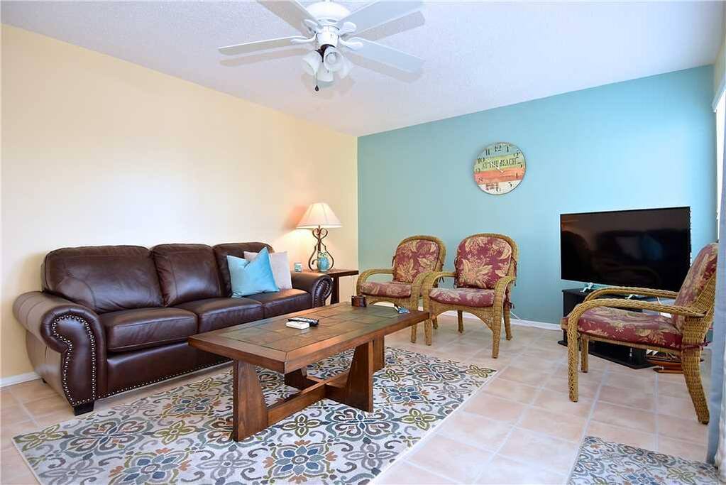 Can You Say Movie Night?! - Stretch out on the sofa or curl up in one of the armchairs, and watch a movie on the living room’s fl