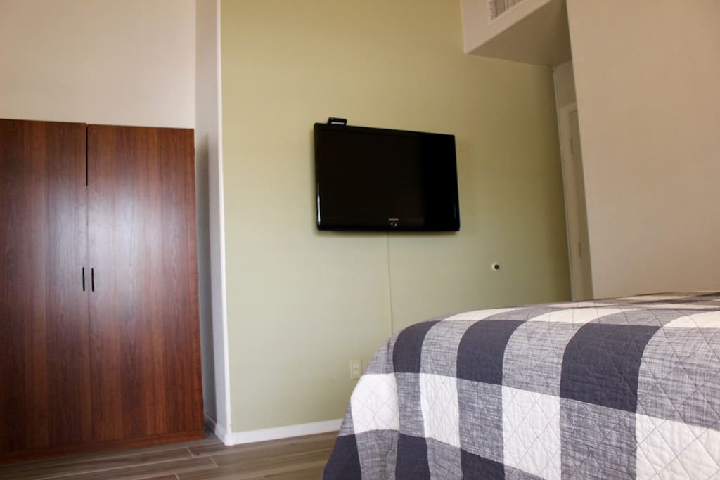 Inside the room hangs a 40 inch Samsung HDTV with cable.