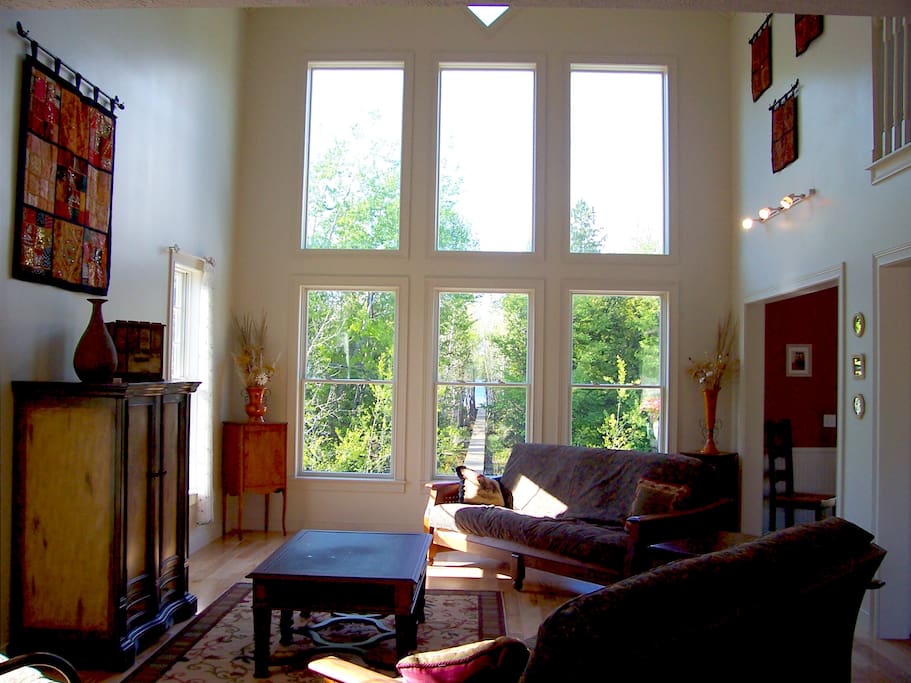 Great room (you can see path to water's edge in middle window)