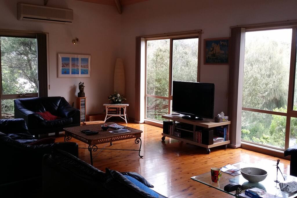 Living Area with large flat-screen TV, Foxtel, Stereo, seats 9