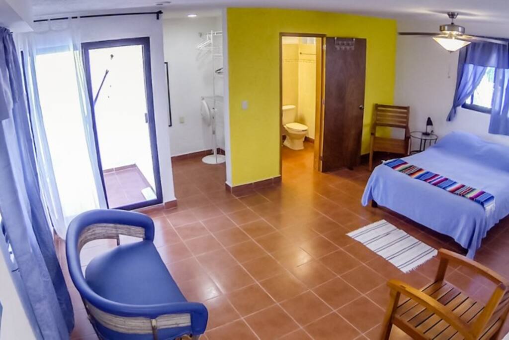Queen bed, full bath and balcony on the second floor.