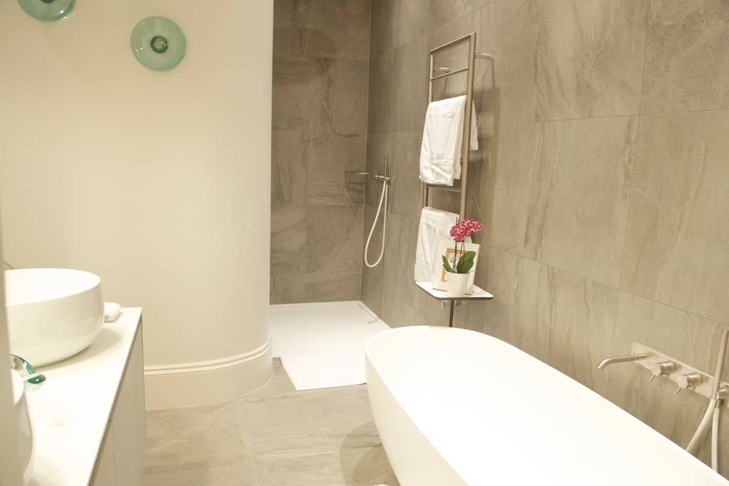 En suite bath-shower double sink private toilet
