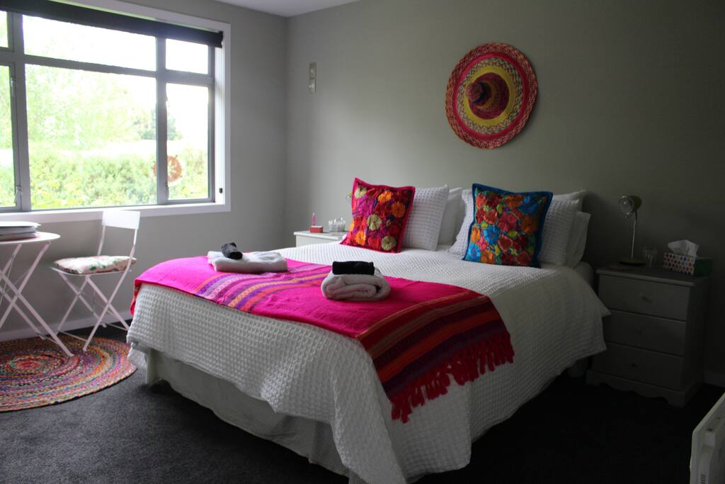 Sunny, warm and comfortable queen sized bed