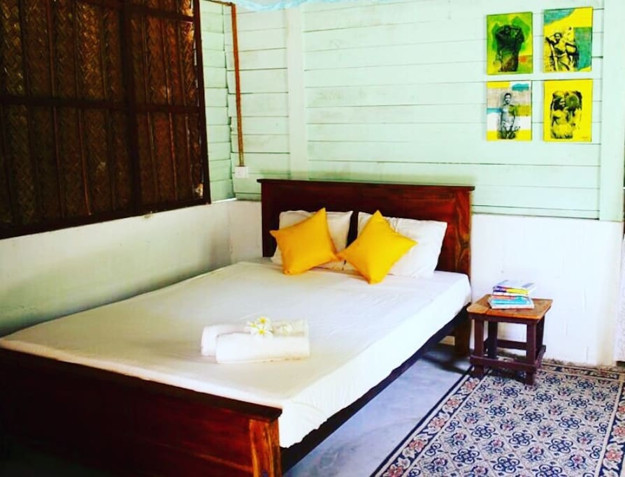 Our cabanas are individually designed rustic, traditional and with pops of colour! Check out our unique artworks. This is an interior glimpse of cabana 4.
