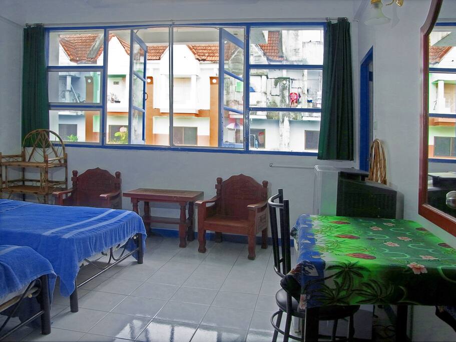 Comfort twin room with fan, private bathroom, TV and fridge