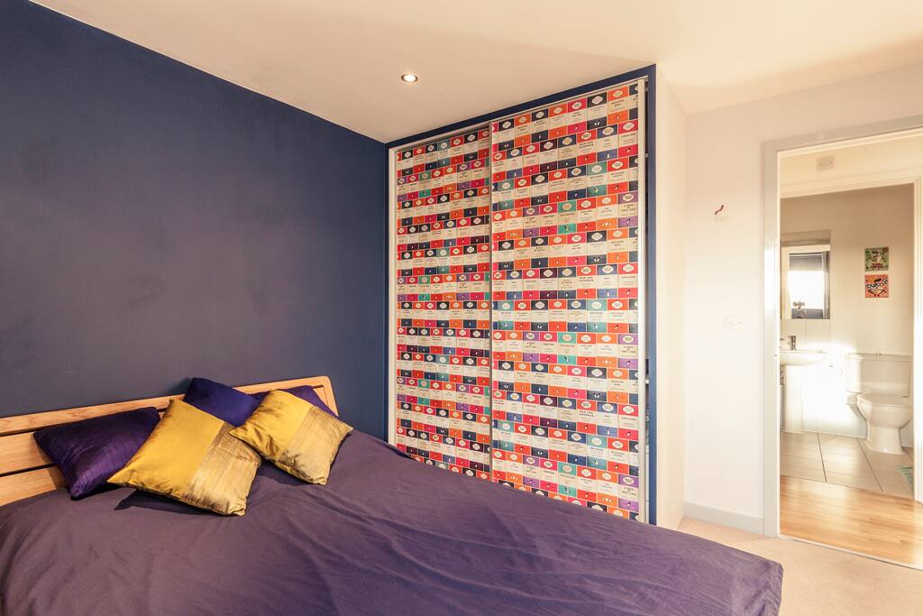 Airbnb bedroom with shower room opposite.