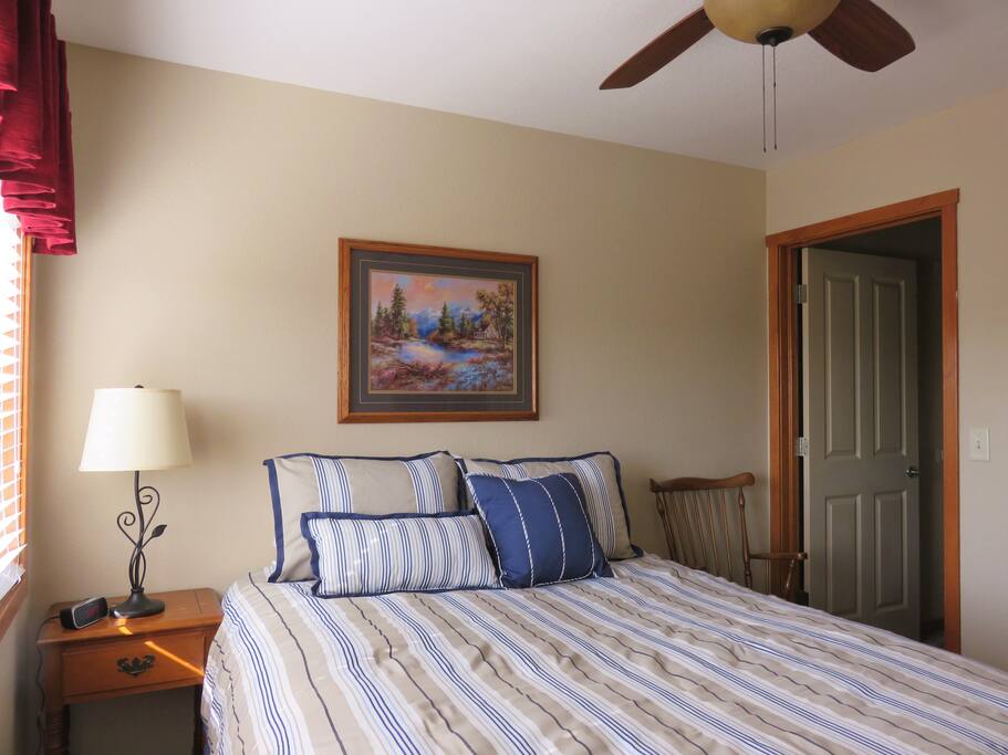 New queen bed and new linens, with walk in closet, dresser.