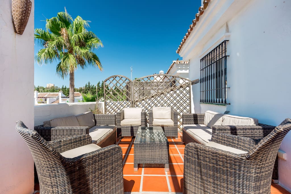 Main terrace with BBQ, dining table & Lounge sofa