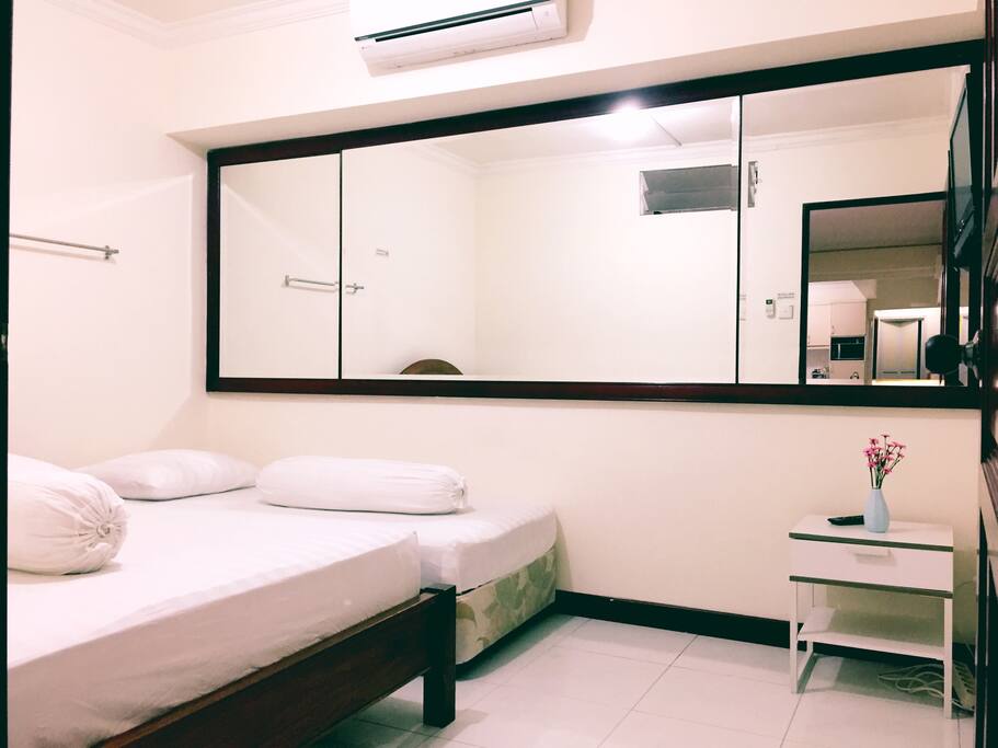 1 Queen + 1 single sized bed (AC & TV inside)