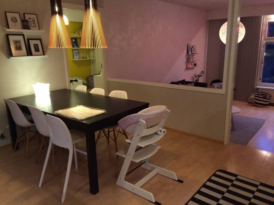 Dining table with 6 chairs. We no longer have the baby high chair which is in the picture, but a travel high chair is available as well as two junior chairs.