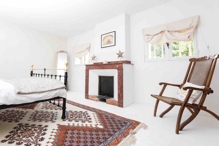 Main bedroom has a super king size bed . 