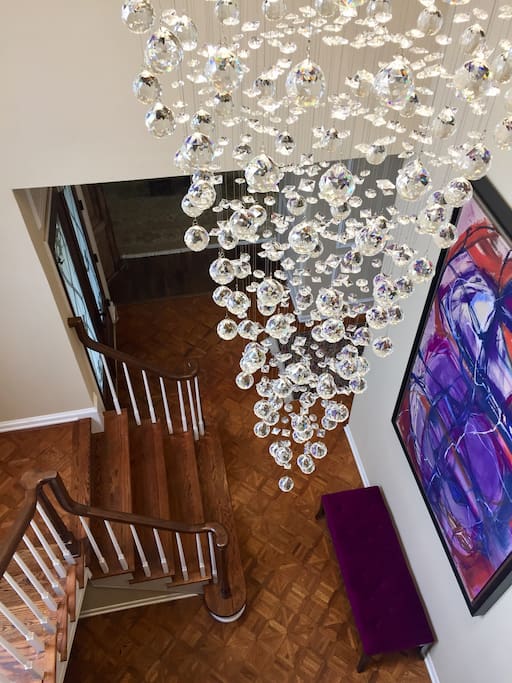 Another view of the entry showing large colorful artwork.