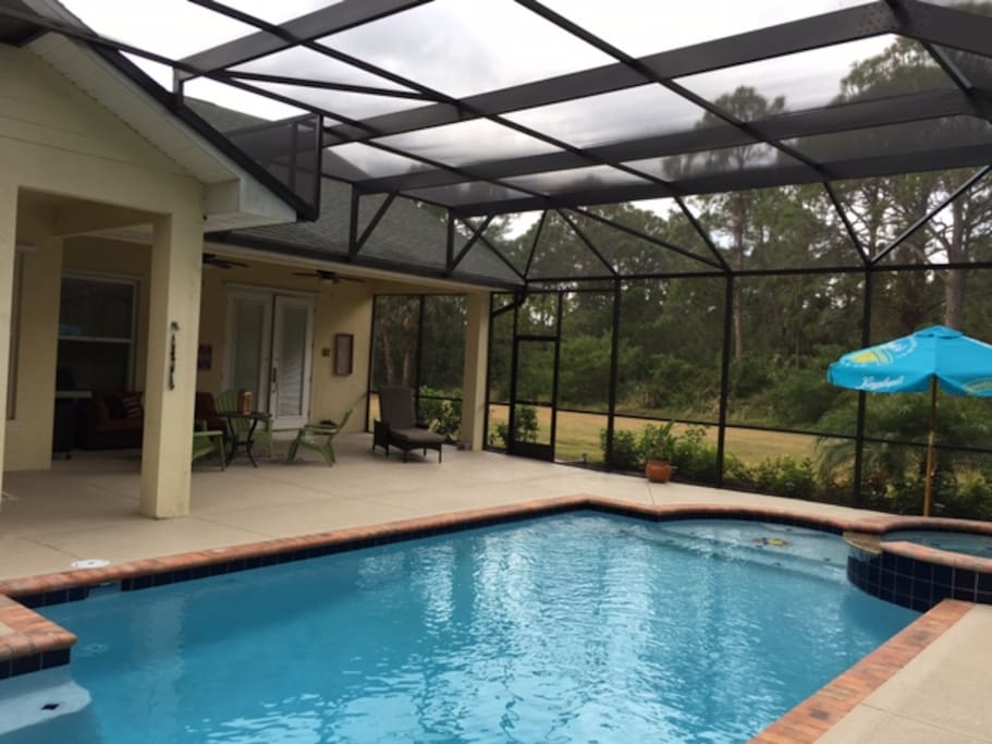 Back patio with salt water pool/spa.