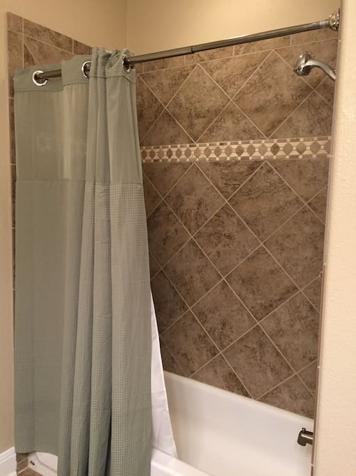 Full size bathroom with shower or tub