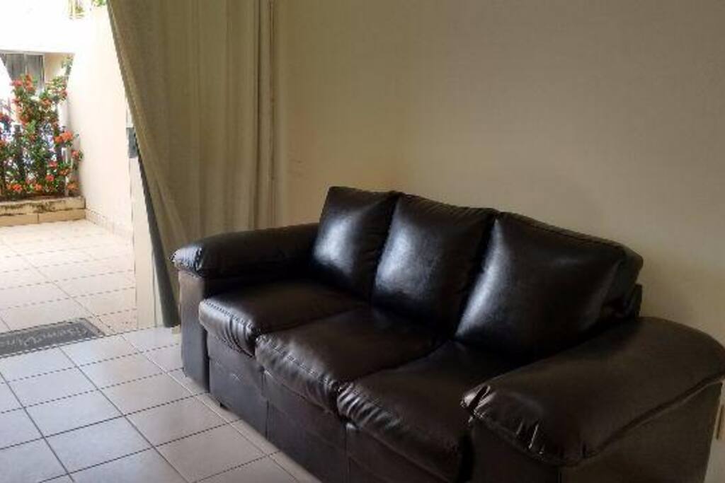 Sala de estar com TV e Ar