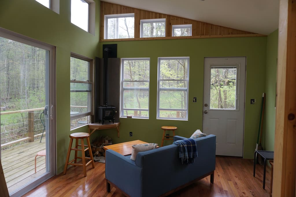 Main seating area with mini woodstove.