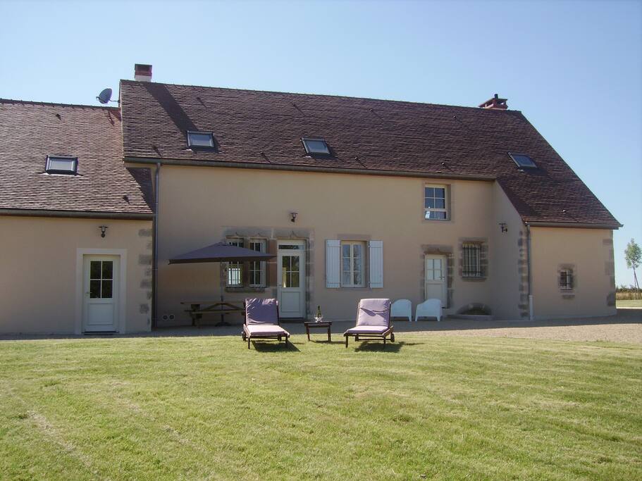Front garden overlooking valley with dining area