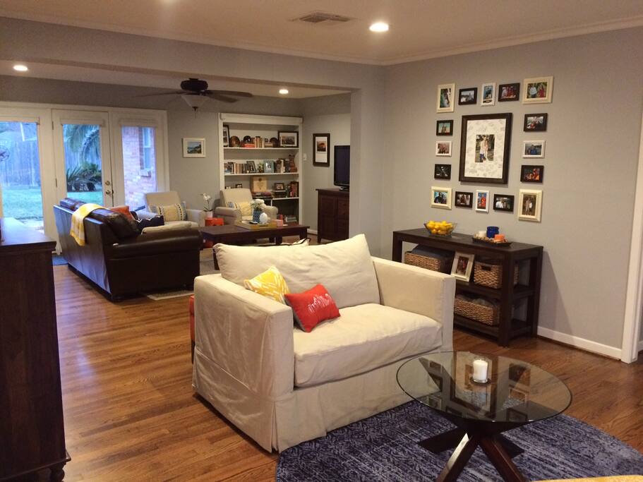 Another angle of the front sitting area and sleeper sofa, which leads into the main living room and connected to the dining room.