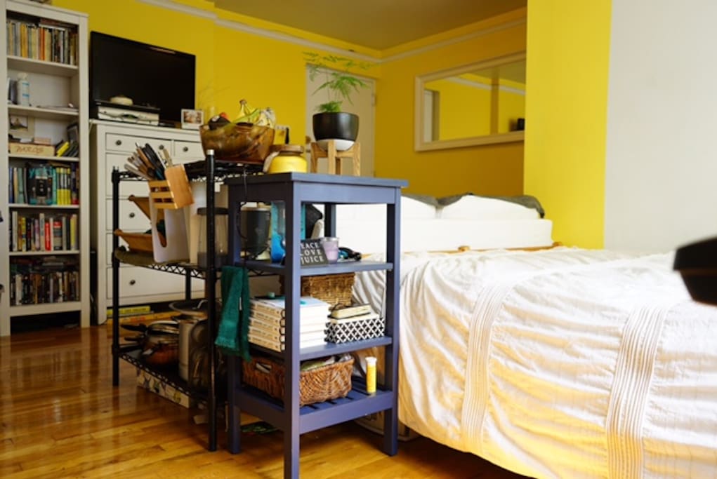 Books, TV, and a cozy couch to enjoy in your break times from the city life.